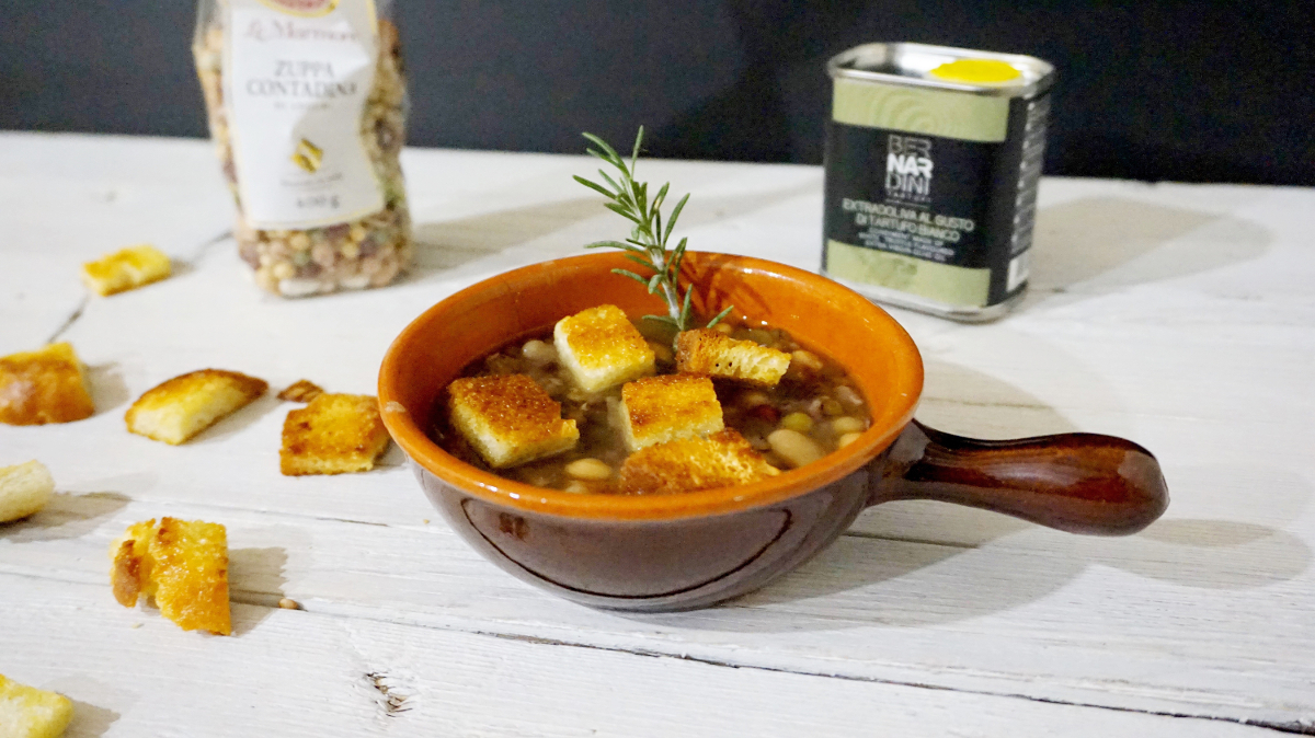 zuppa di legumi con pane croccante all'olio extra vergine di oliva al tartufo bianco